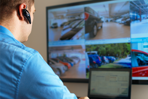Man Reviewing Surveillance Camera Systems